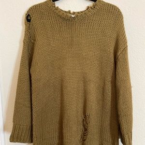 Cute distressed sweater